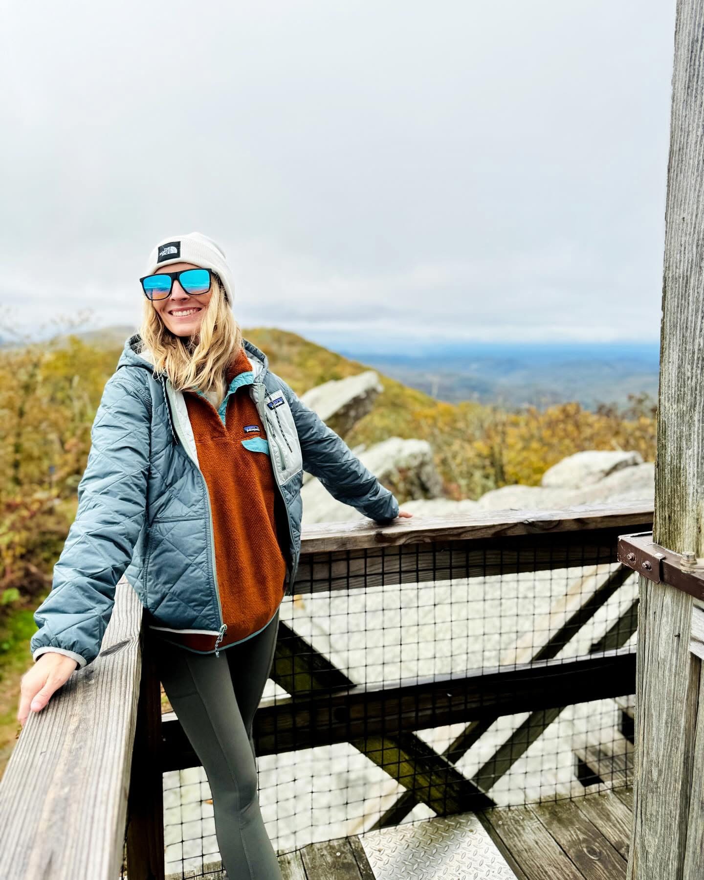 Nicole at a mountain lookout in a Patagonia fleece